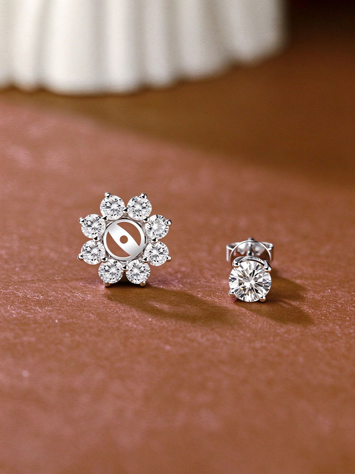 Removable sunflower diamond jacket beside the solitaire lab-grown diamond stud