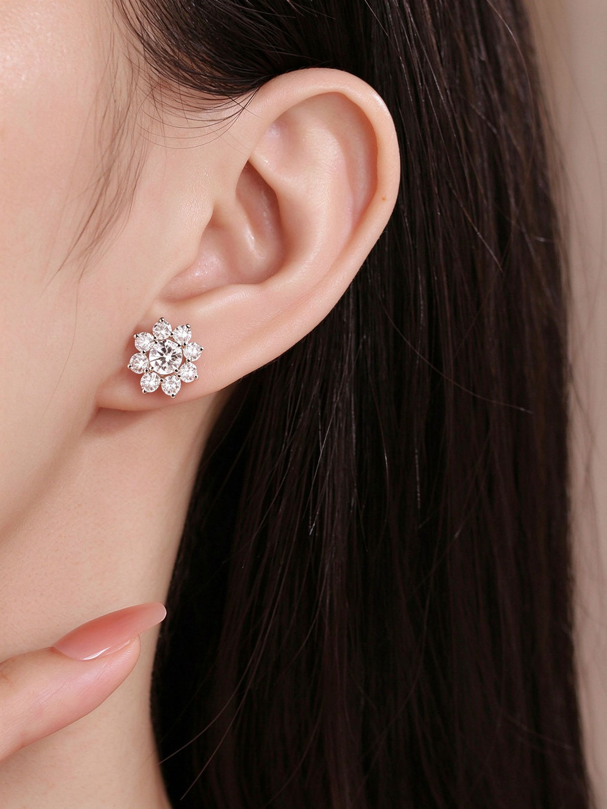 Sunflower lab-grown diamond stud earring worn on the ear