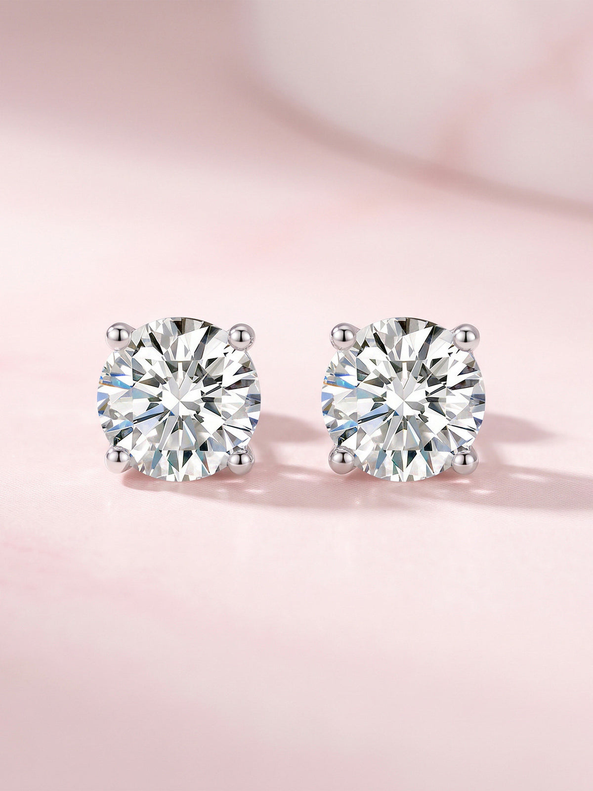 Four-claw round lab-grown diamond stud earrings, front view