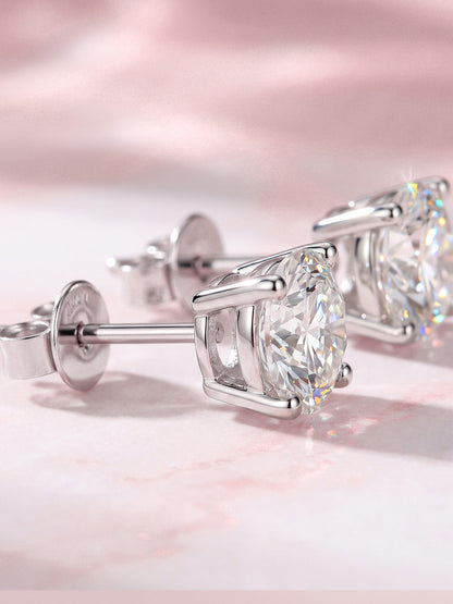 Round lab-grown diamond stud earrings with butterfly backs, side view