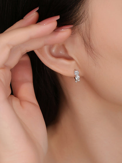Lab-grown diamond huggie earring styled for everyday wear