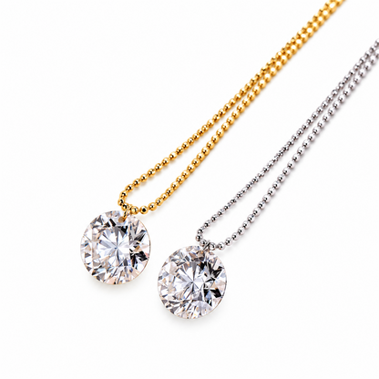 Yellow and white gold round diamond bead chain necklaces on white; digitally retouched supplier detail image
