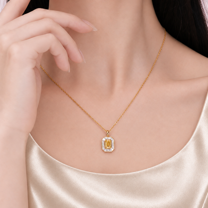Model wearing DANFÉE Deco Halo fancy yellow lab-grown diamond necklace