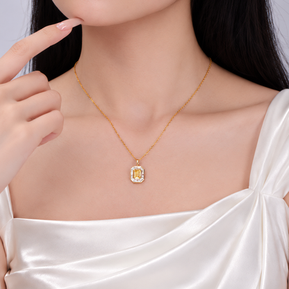 DANFÉE 1 carat fancy yellow emerald-cut halo necklace worn at the collarbone
