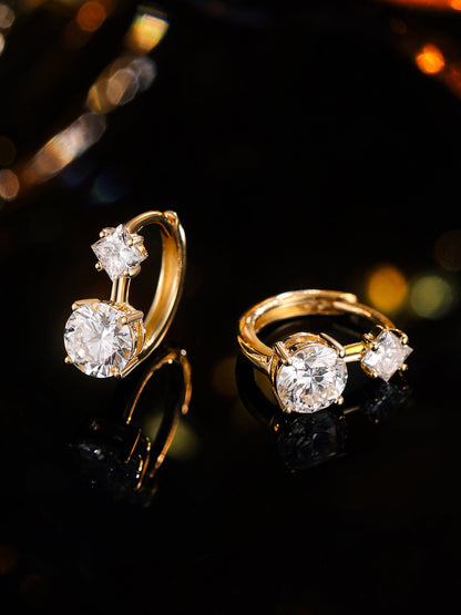 Princess-cut and round lab-grown diamond huggie earrings sparkling on black