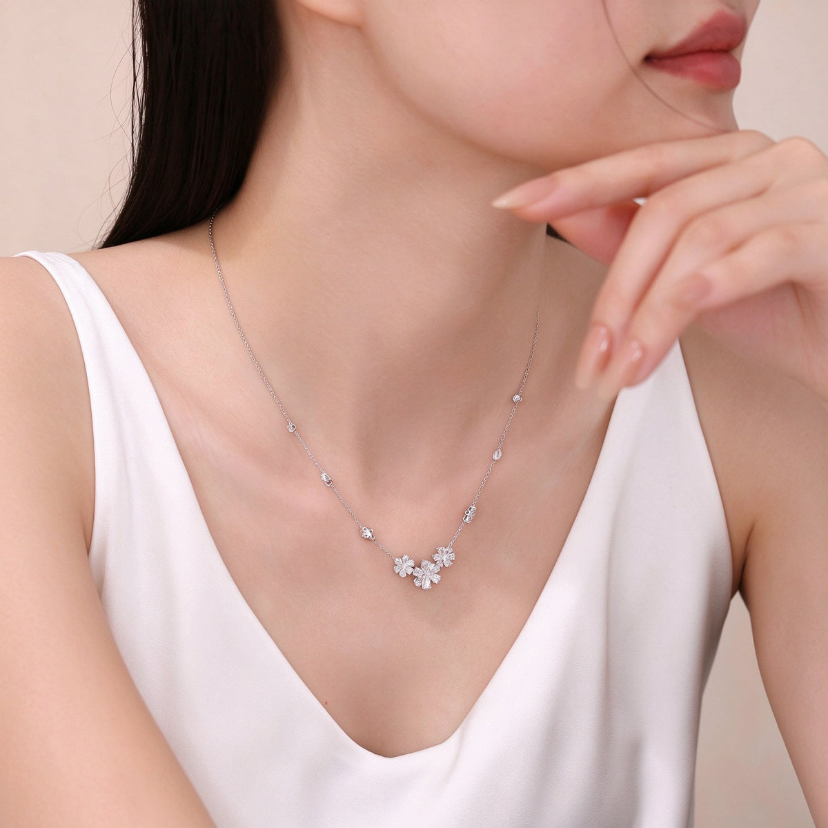 Daisy lab-grown diamond necklace worn at the collarbone