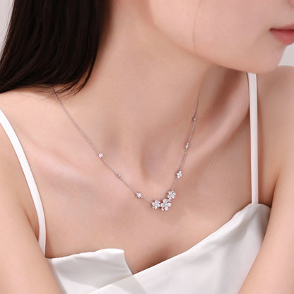 Daisy lab-grown diamond necklace worn at the collarbone
