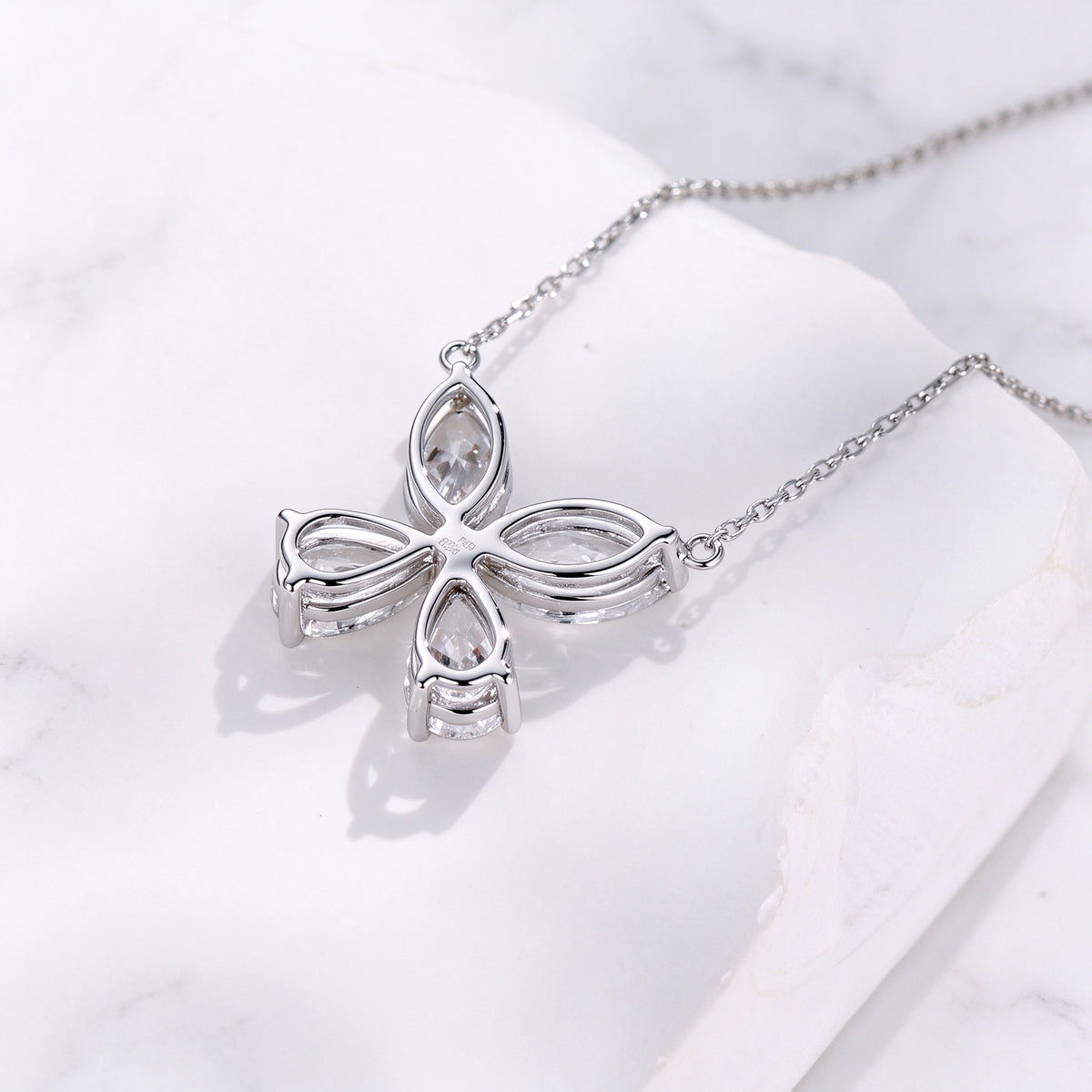 DANFÉE Four-Leaf Clover lab-grown diamond necklace back view, marble background