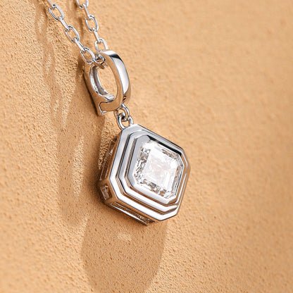 DANFÉE Deco Asscher lab-grown diamond pendant necklace styled on textured stone