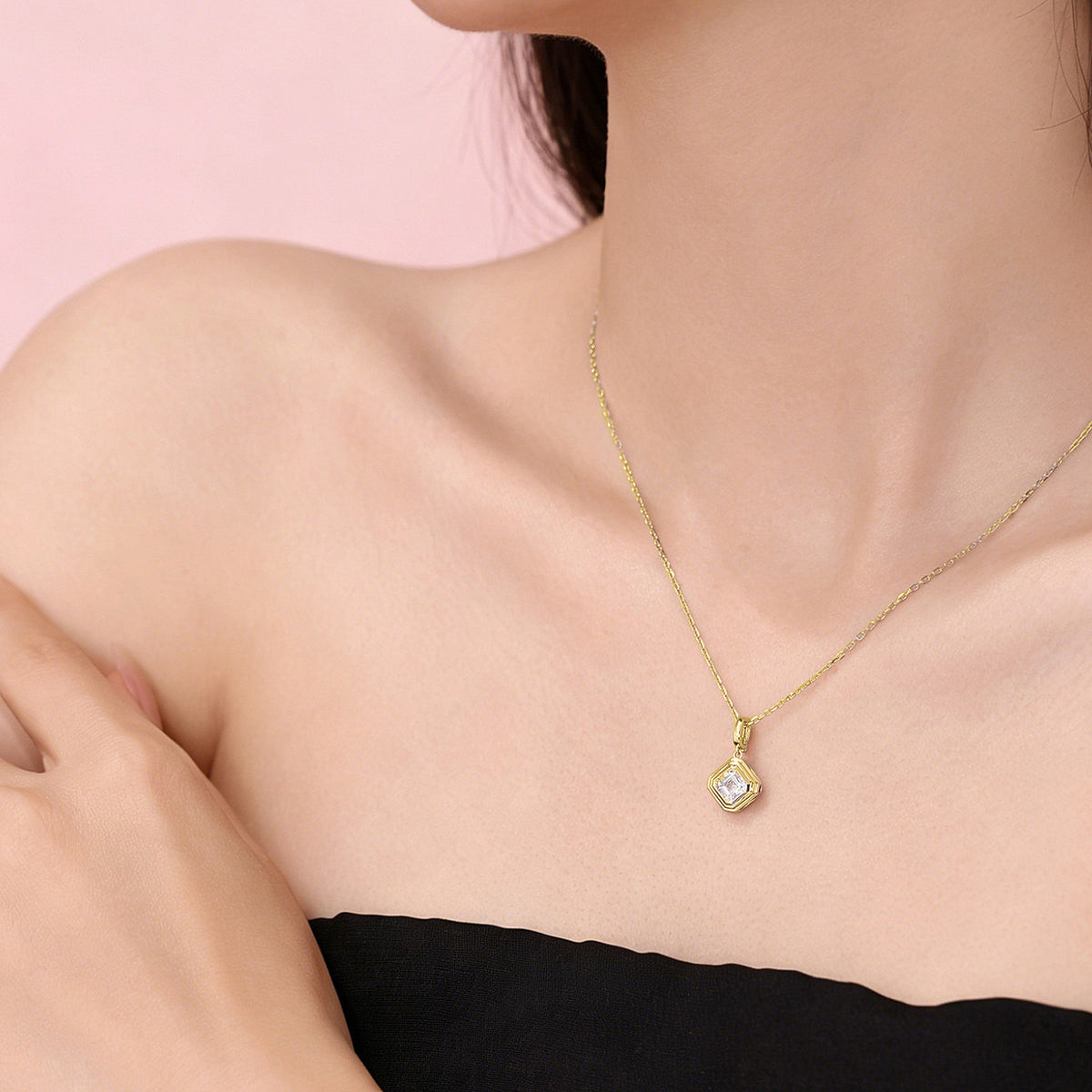 Model wearing the DANFÉE Deco Asscher lab-grown diamond pendant necklace in 18K yellow gold