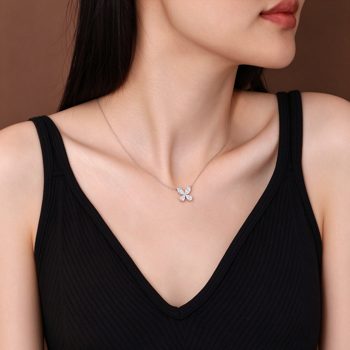 DANFÉE Four-Leaf Clover lab-grown diamond necklace worn by model, black top
