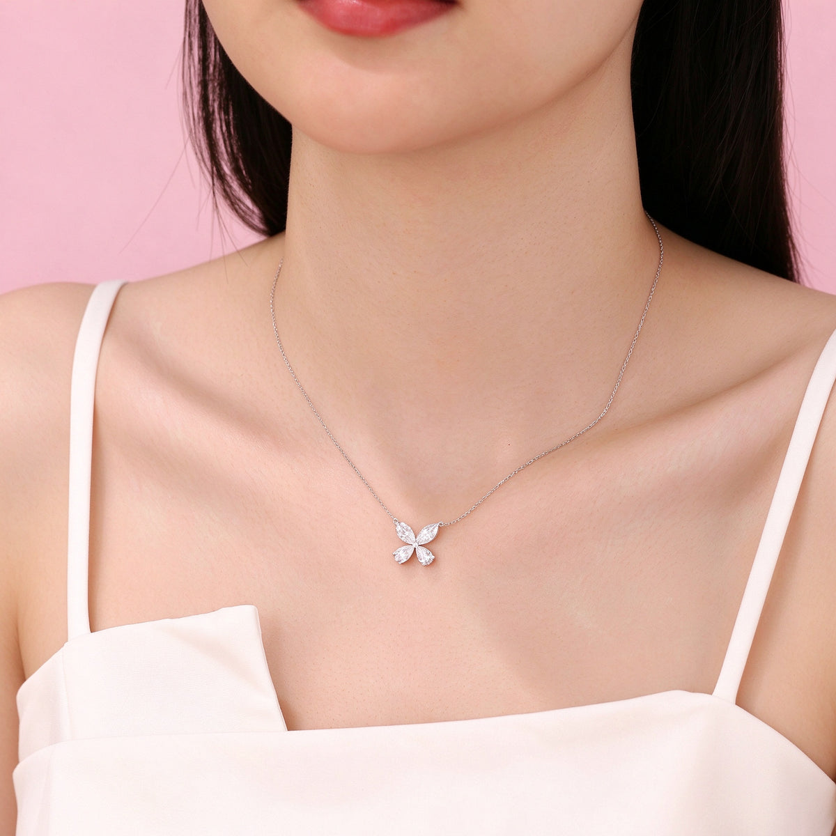 DANFÉE Four-Leaf Clover lab-grown diamond necklace worn by model, white camisole