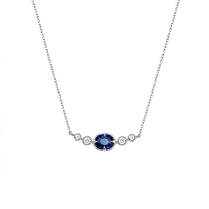 DANFÉE oval sapphire smile necklace in 18K white gold with natural diamonds, front view