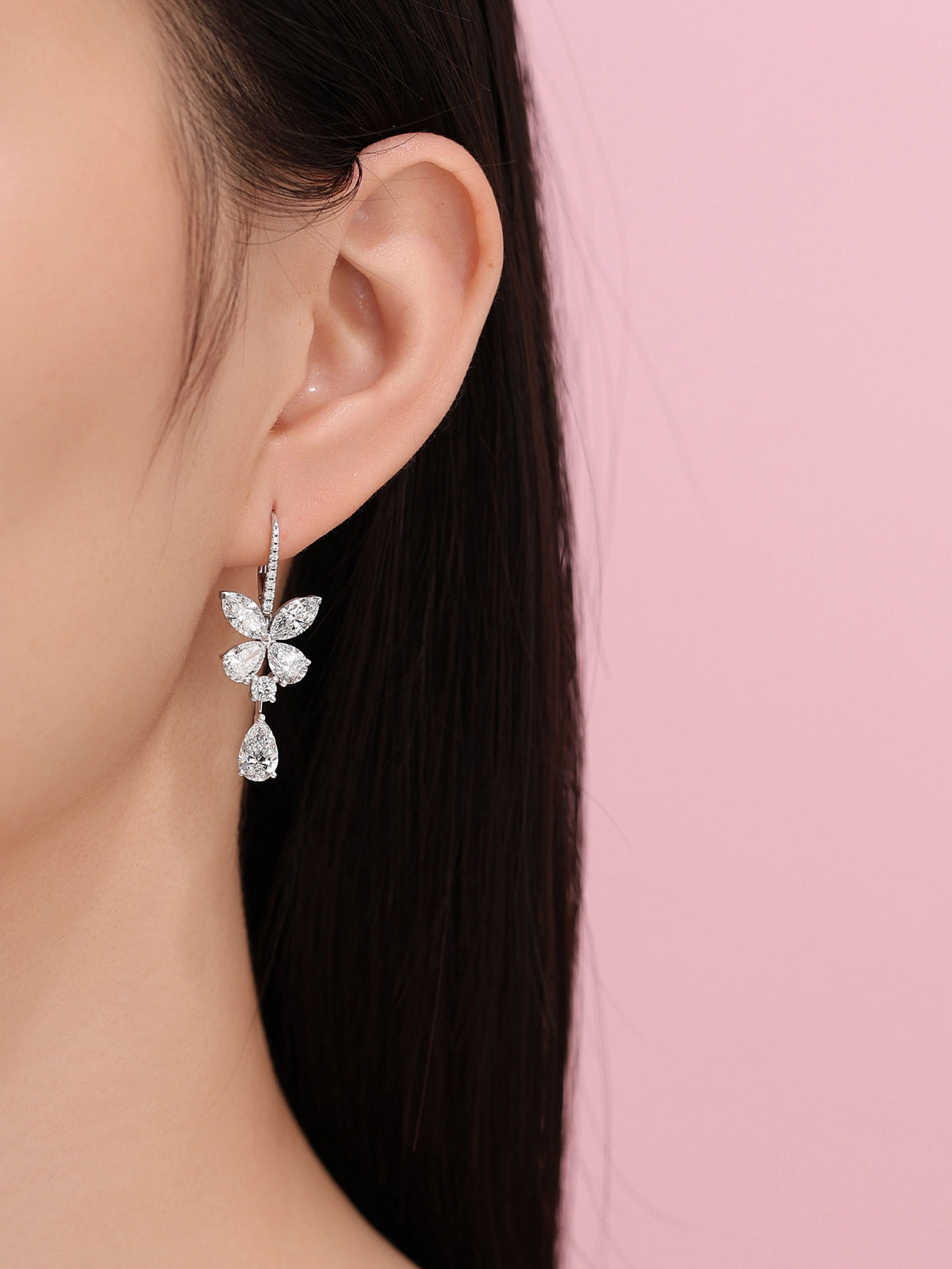 Lab-grown diamond butterfly drop earring on model, D-E VS