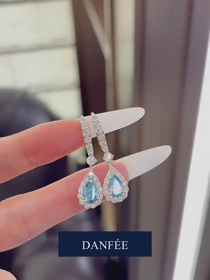 Céleste Pear-Cut Blue Lab-Grown Diamond Halo Drop Earrings in 18K White Gold | 2-6 Carat Total | Fancy Vivid Blue | VS