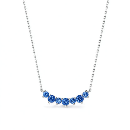DANFÉE Seven-Stone Smile natural sapphire necklace in 18K white gold, front view