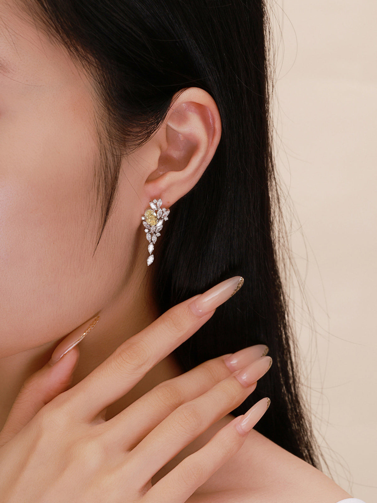 Model wearing Soleil yellow lab-grown diamond cluster drop earring